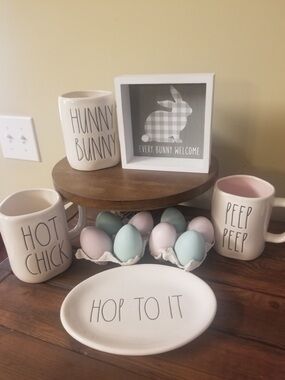 Rae Dunn white ceramic Easter mugs and platter with pastel eggs